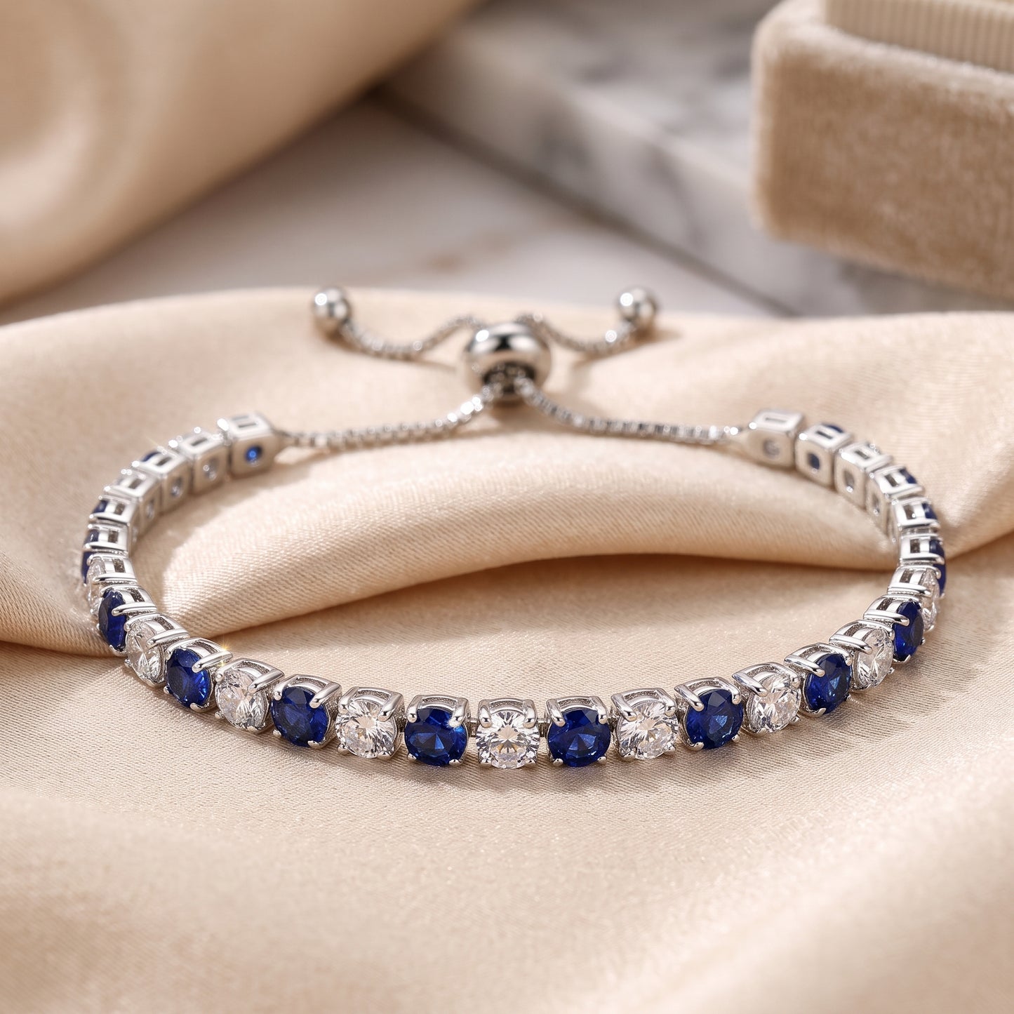Sterling Silver Tennis Bracelet with Blue and White Cubic Zirconia